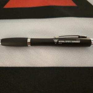 A black matte pen with chrome accents and the National Esports Tournament logo printed on the barrel.